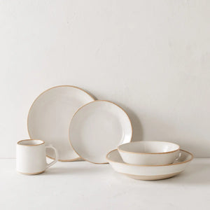 cream colored dishes with natural rim