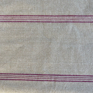 natural colored table runner with sets of red pinstripes