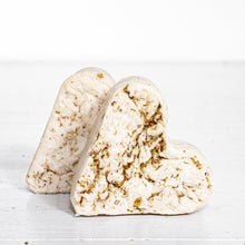 Load image into Gallery viewer, cream colored heart shaped soap with oat and chamomile flakes
