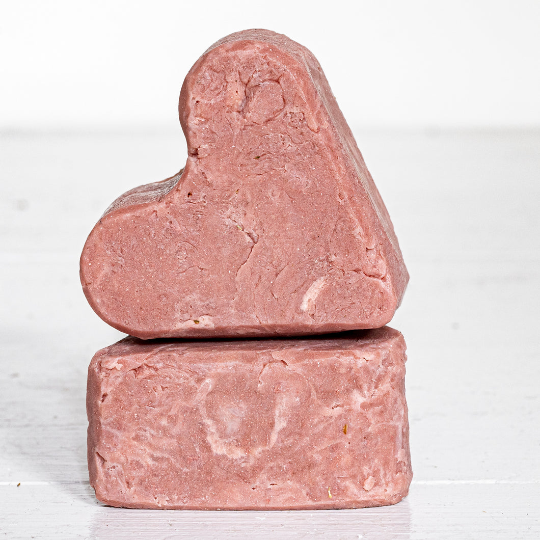 rose colored clay heart shaped soap