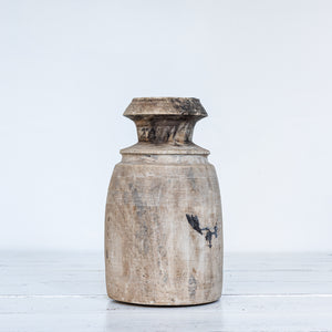 aged wooden pots in various sizes