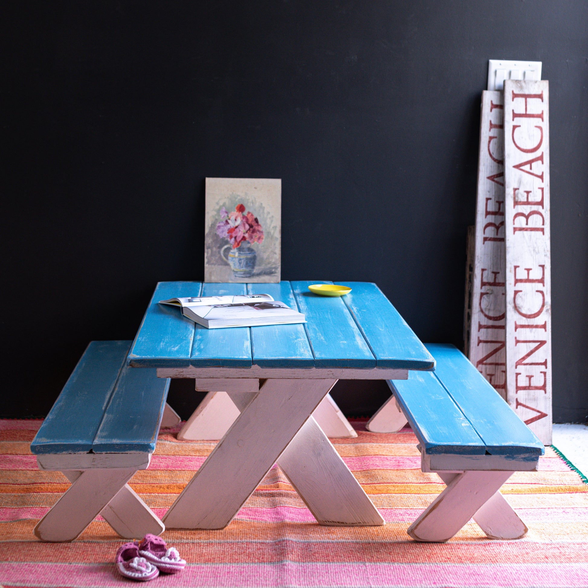 painted wood kids picnic table and benches with turquoise blue top and white bottom