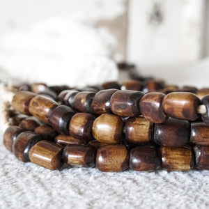 strand of brown wood beads