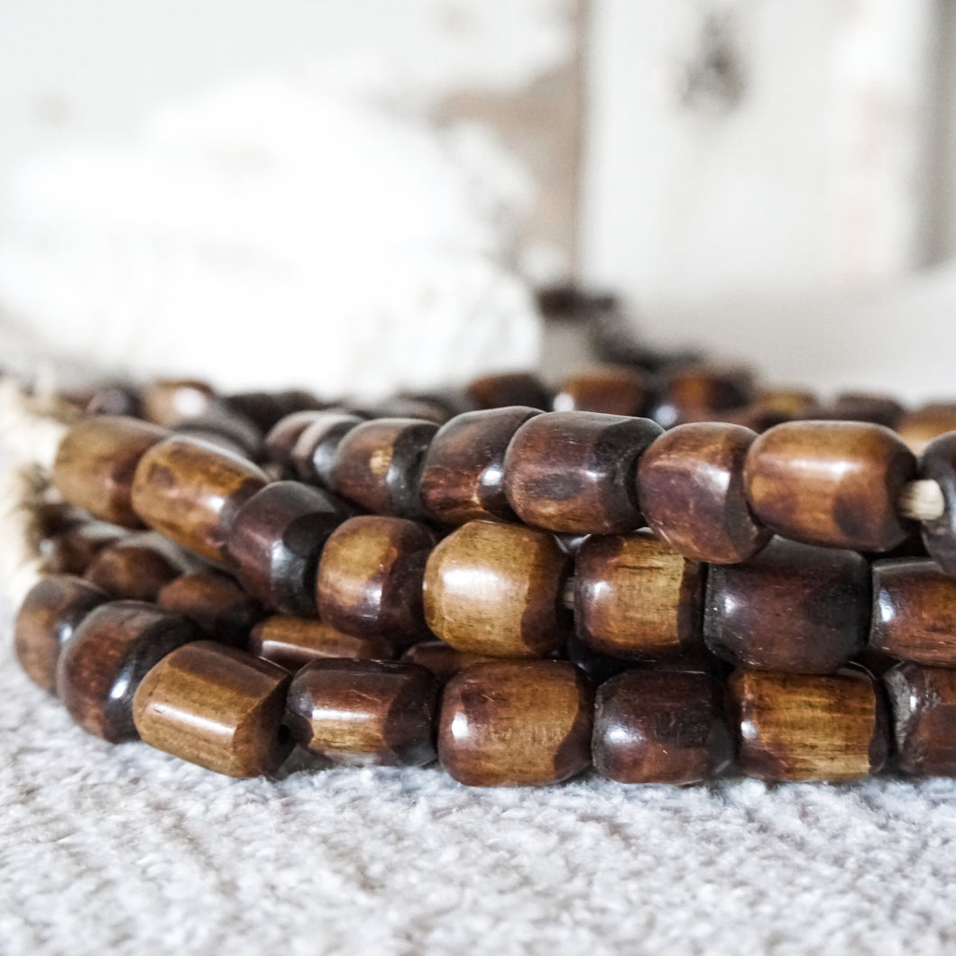 strand of brown wood beads