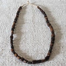 Load image into Gallery viewer, strand of brown wood beads