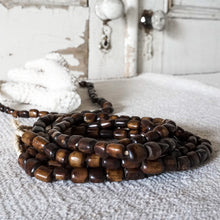 Load image into Gallery viewer, strand of brown wood beads