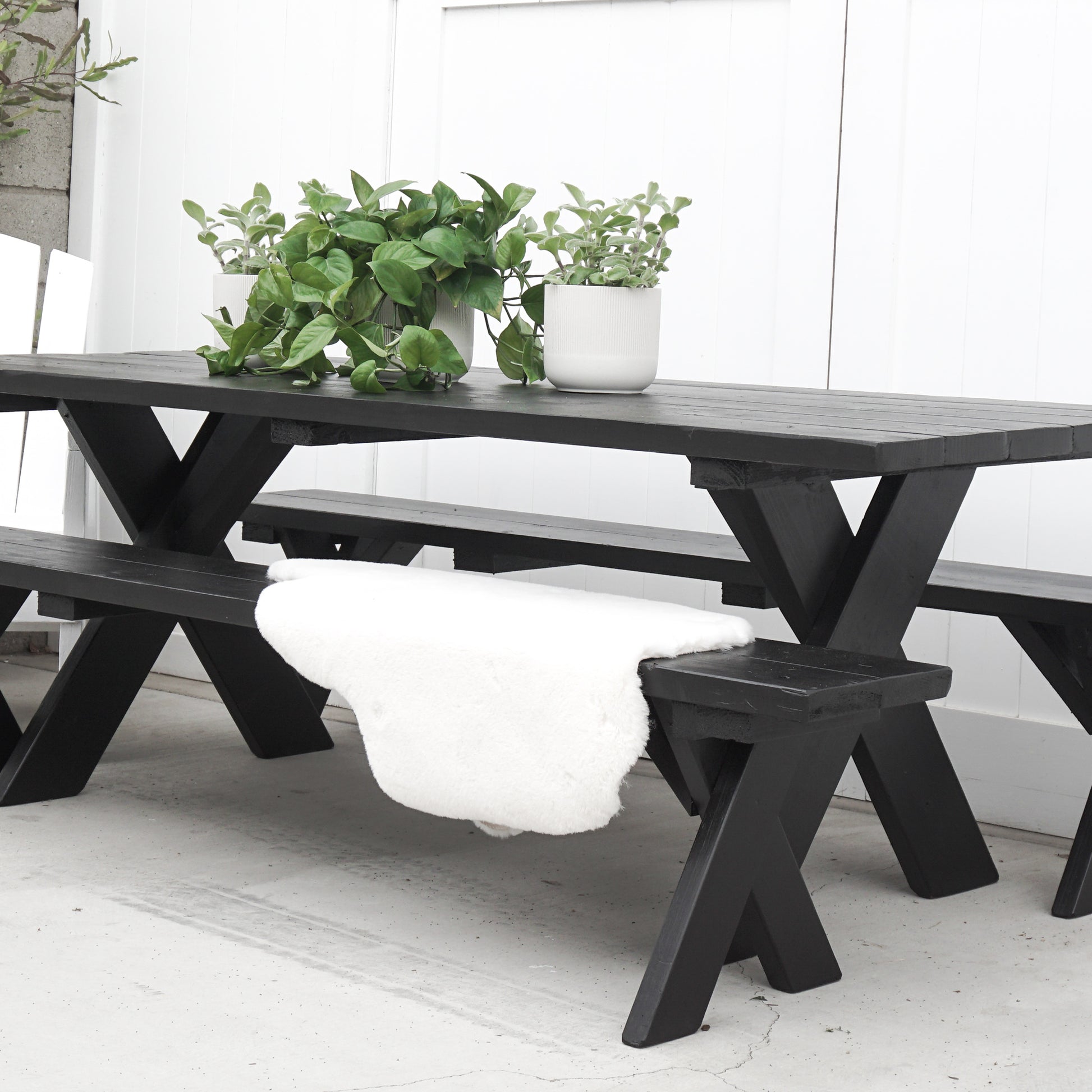 black painted redwood picnic table and benches