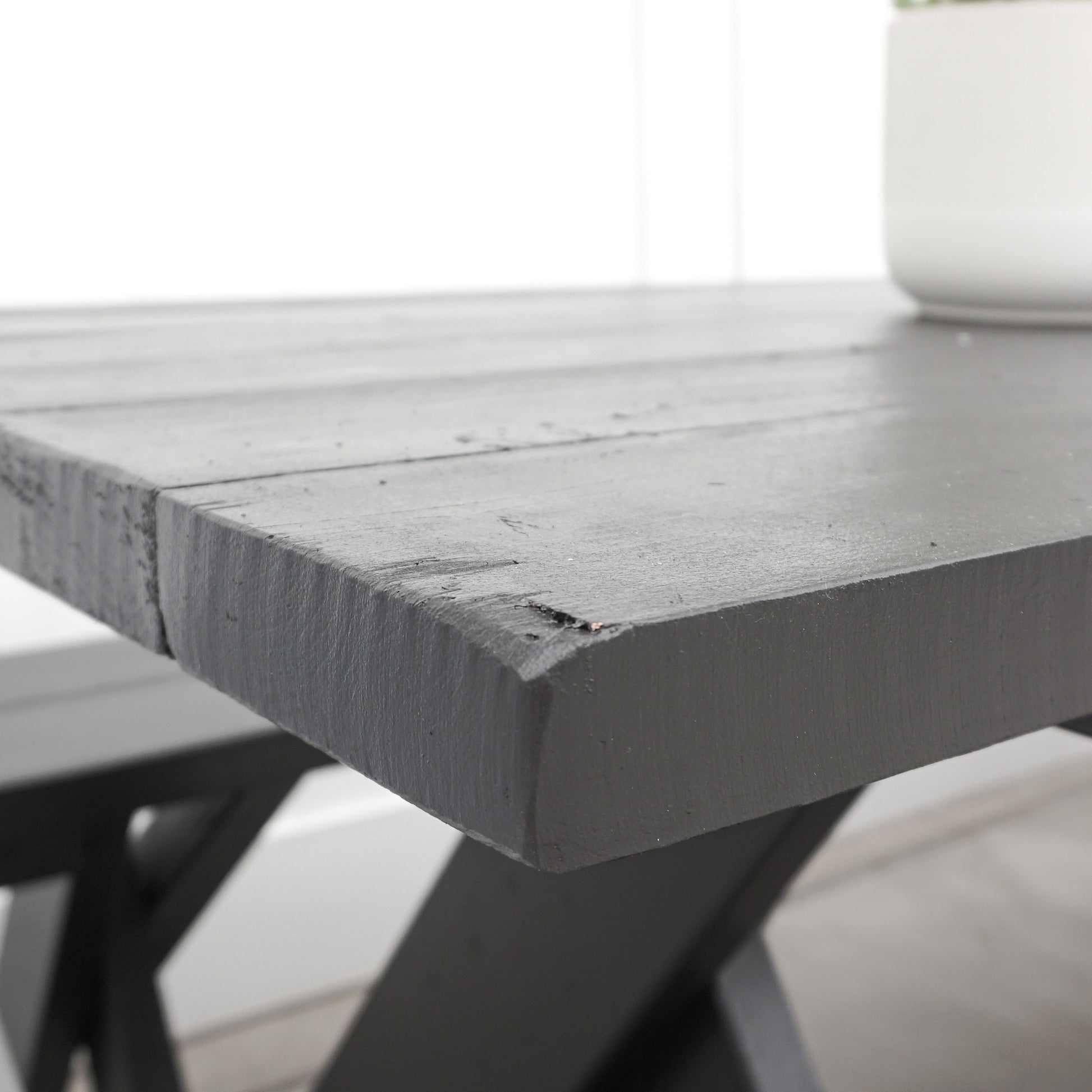 black painted redwood picnic table and benches