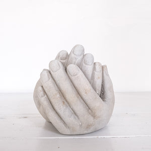 Aged white statue/bowl of open hands