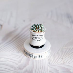 porcelain white match strike with black letters