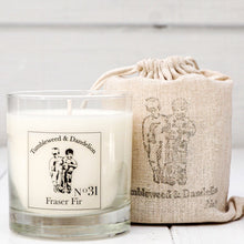 Load image into Gallery viewer, Fraser Fir scented clear glass candle with black logo