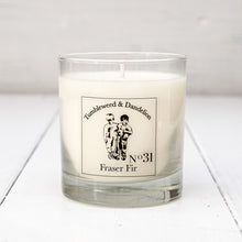 Load image into Gallery viewer, Fraser fir scented clear glass candle with Tumbleweed and Dandelion logo