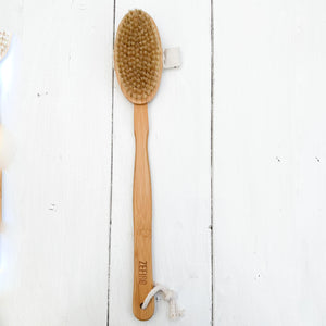 long handle body scrub brush with natural bristles....long handle is removable and brush has a soft handle for hand to slide through for easy usage