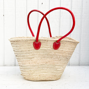 wicker market basket with red leather handles