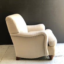 Load image into Gallery viewer, cream colored upholstered lounge chair made with vintage feedback fabric with brown wooden feet