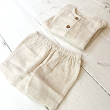 Load image into Gallery viewer, ivory colored shirt and short set, shirt long sleeved with buttons