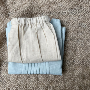 baby short and top set,pale blue sleeveless top and tan shorts