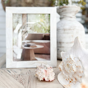 cream colored mother of pearl picture frame