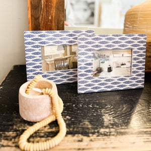 blue and white patterned picture frame