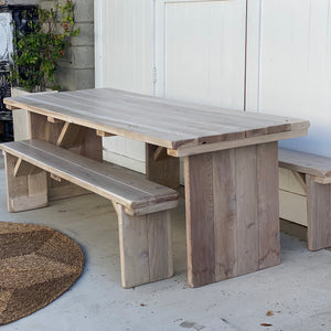 wood picnic table with planked top and two benches
