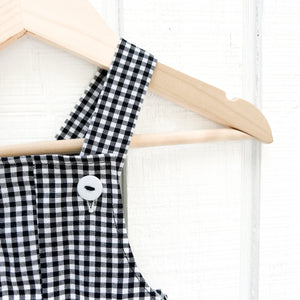 black and white check baby sleeveless romper with white buttons