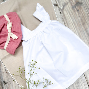 white baby sleeveless cotton dress