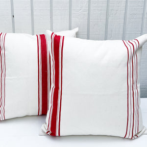 square white pillow with red stripes