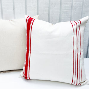 square white pillow with red stripes