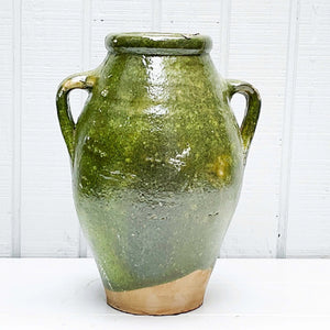 green glazed terra cotta jugs with two handles on side  Edit alt text