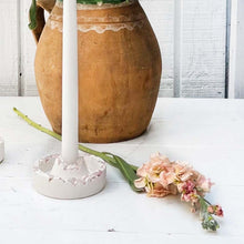 Load image into Gallery viewer, ceramic white taper candle holder with crushed rose quartz pieces