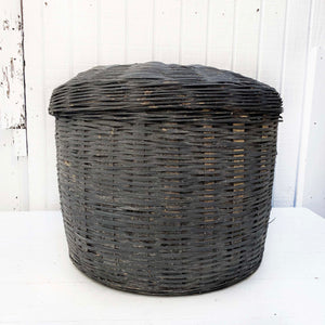 large charcoal colored basket with lid