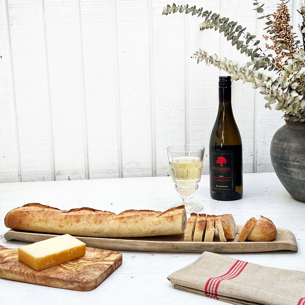 elongated wooden board for serving baguettes
