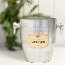 Load image into Gallery viewer, silver ice bucket with brass plaque on front and French words
