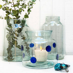 lightly green tinted large glass jar with blue embossed dots