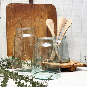 lightly tinted green oversized glass jars