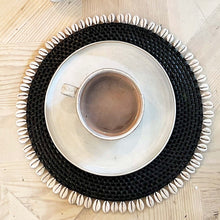 Load image into Gallery viewer, black rattan placemat with off white shells on edge