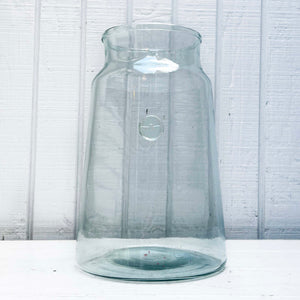 lightly tinted green oversized glass jar