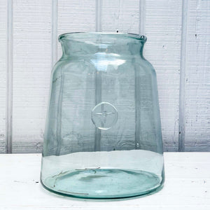 lightly tinted green oversized glass jar