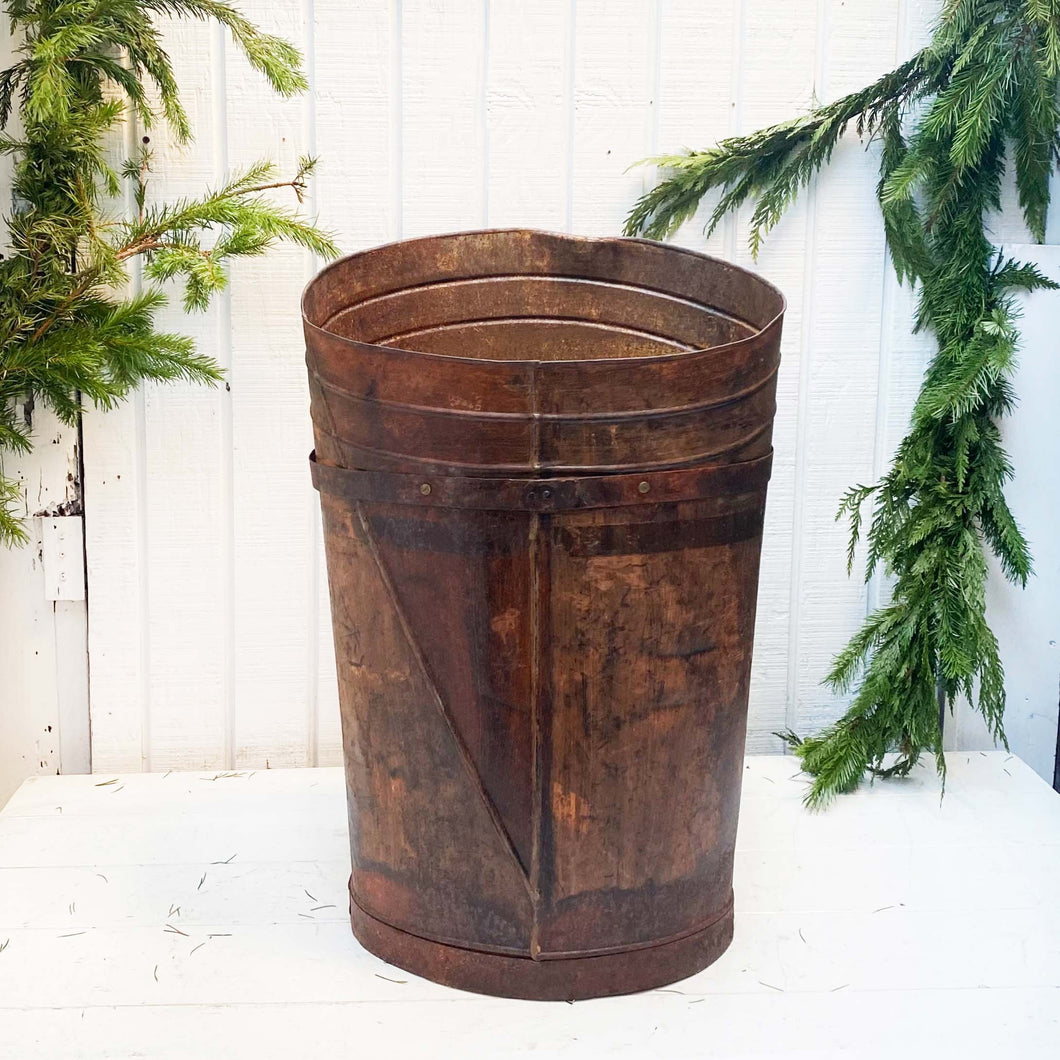 rusted metal rustic basket/bucket