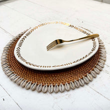Load image into Gallery viewer, brown rattan placemat with off white shells on edges