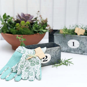 green and white floral gardening gloves