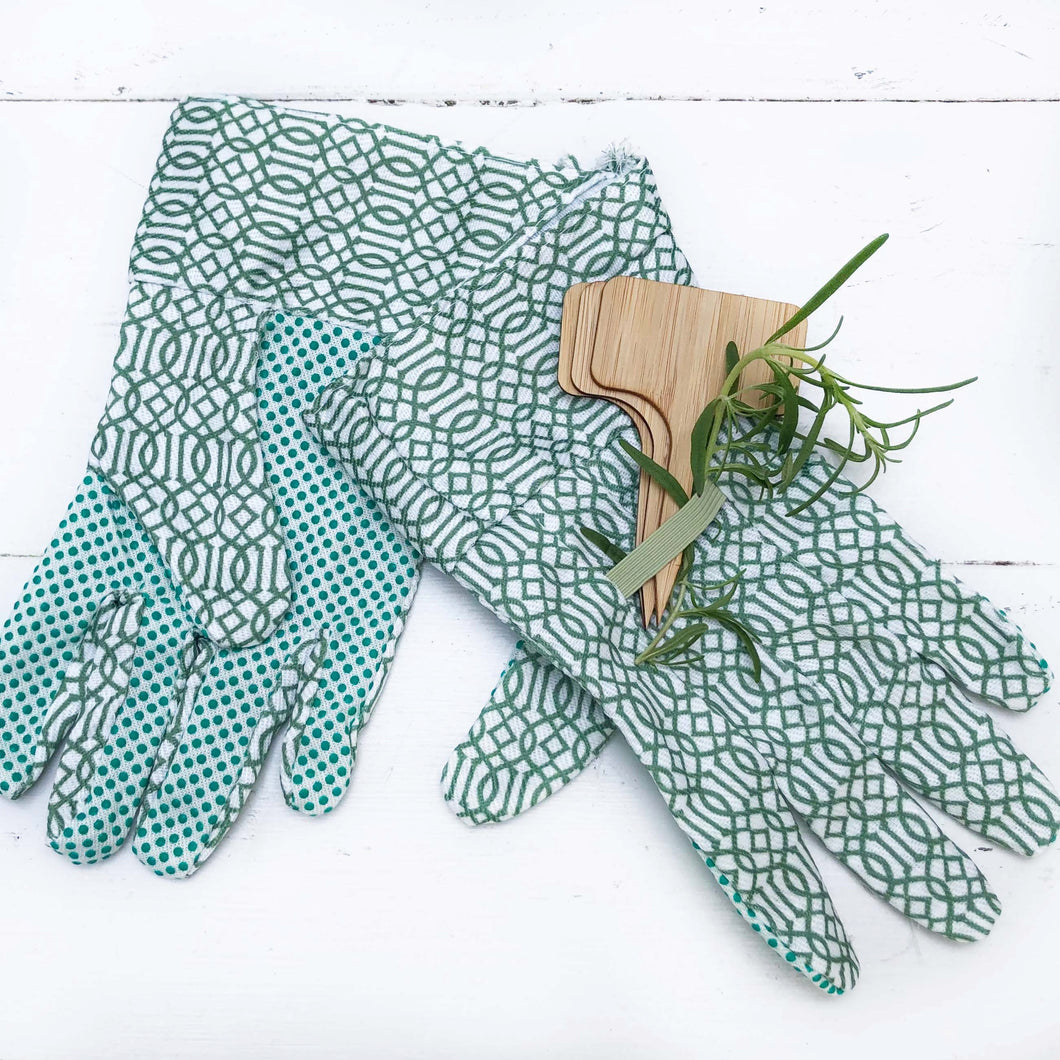 green and white floral gardening gloves