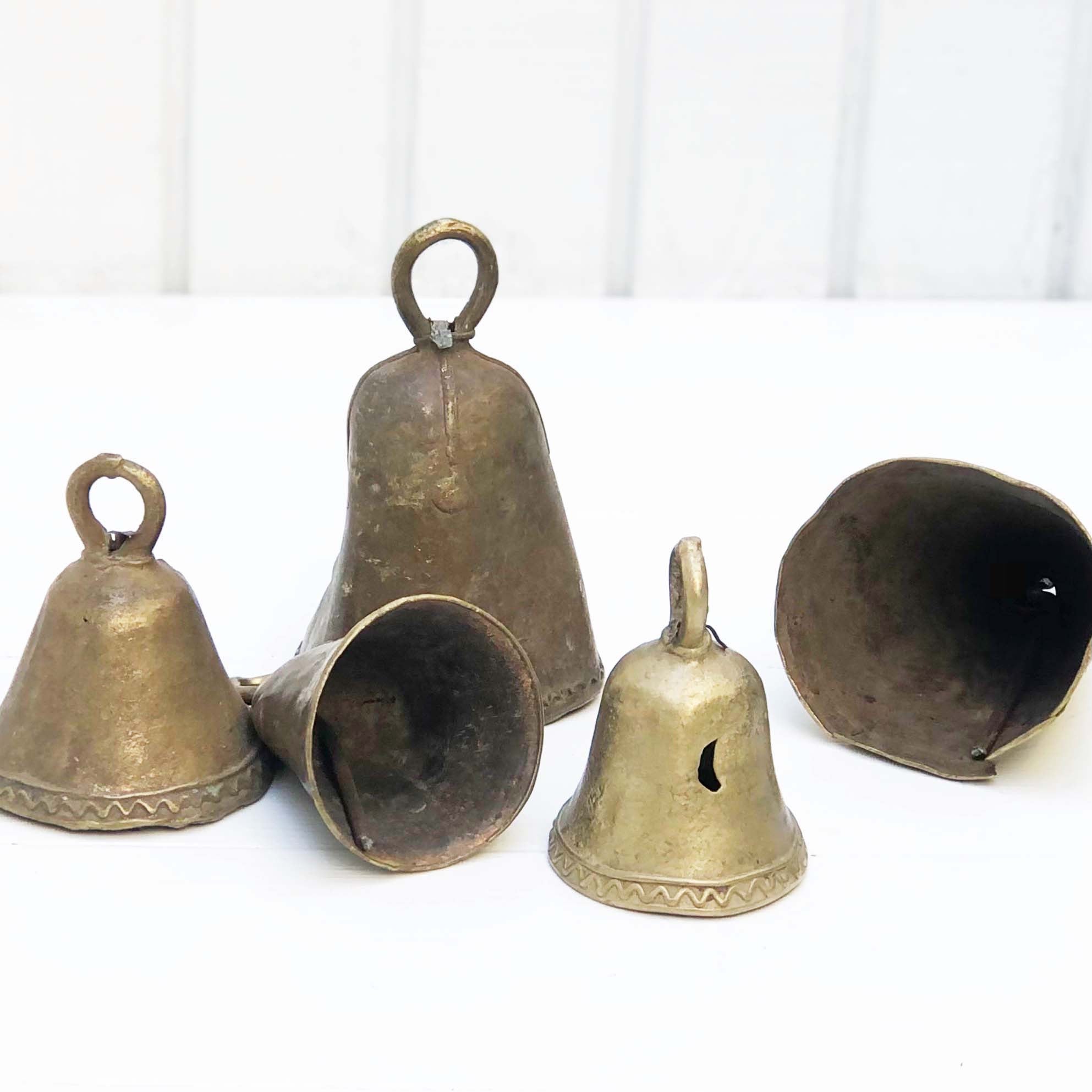 vintage brass bells, sizes and color vary