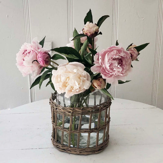 glass vase jar wrapped in rattan