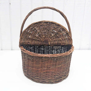 brown wicker picnic basket with top and handle