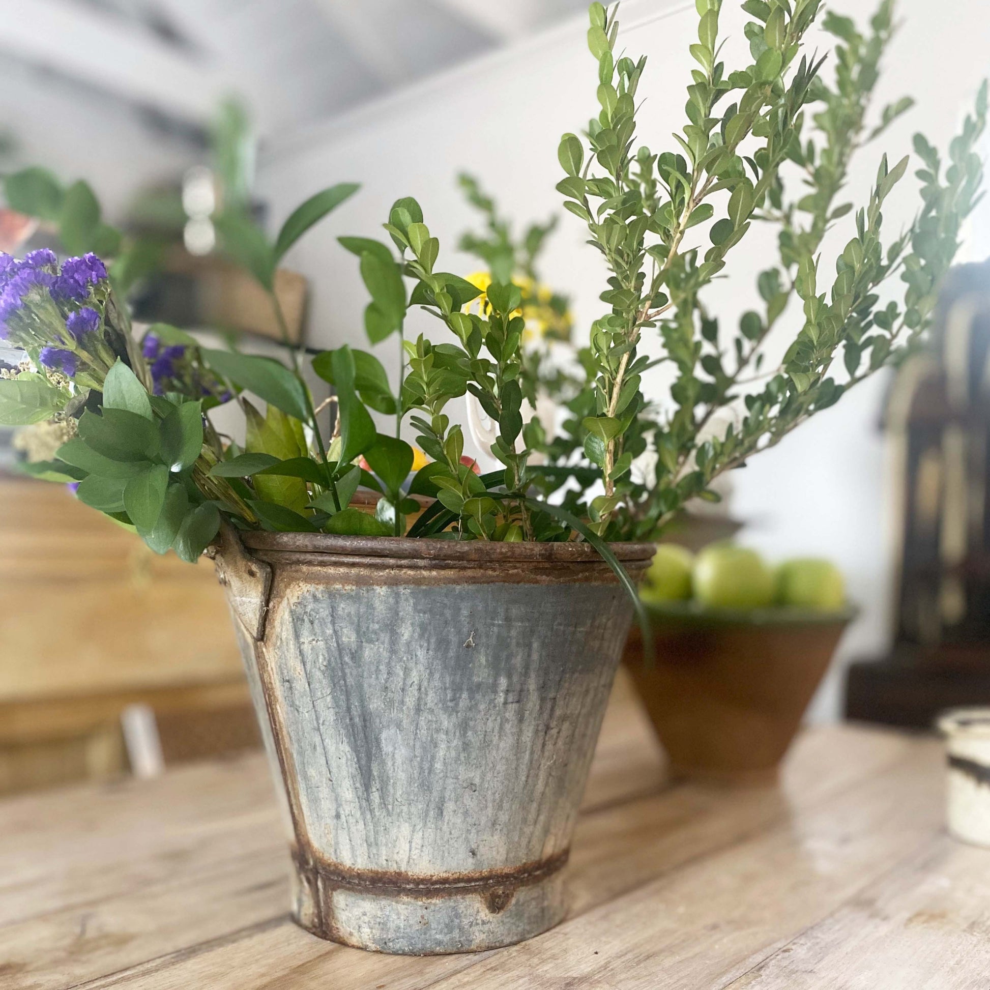 rustic zinc metal bucket with rusted handles