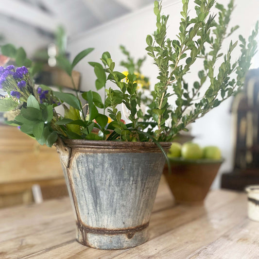 rustic zinc metal bucket with rusted handles