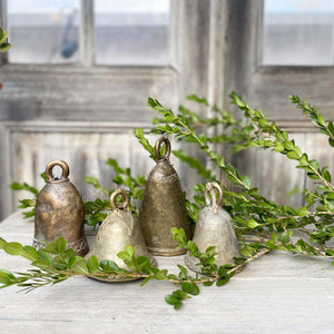 brass hand held dinner bells in varying sizes and  finishes