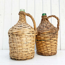 Load image into Gallery viewer, green glass wine jug wrapped in wicker with handle