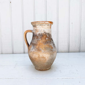Vintage Terra Cotta Pitcher with heavy aging of white and black patina